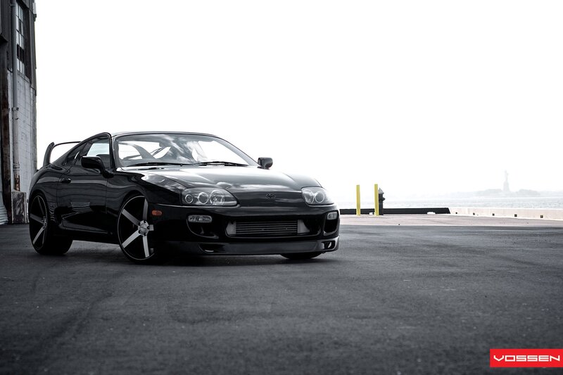 Black Sports Car — Dramatic, Photograph, Building, Fire Hydrant