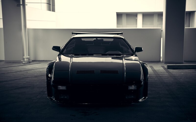 Black Sports Car — Dramatic, Photograph, Building, Parking Garage