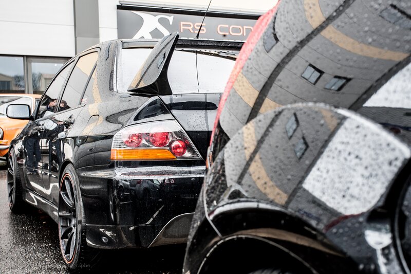 Black Sports Car — Dramatic, Photograph, Building, Rain
