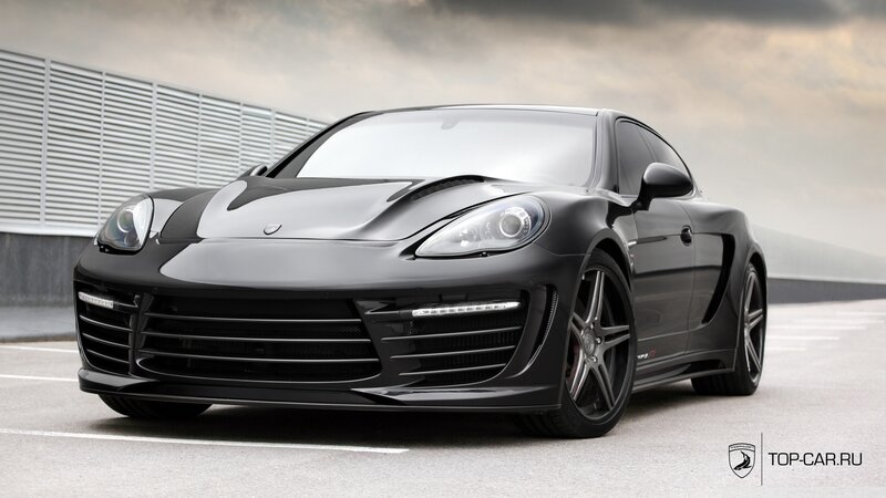 Black Sports Car — Dramatic, Photograph, Building, Sky