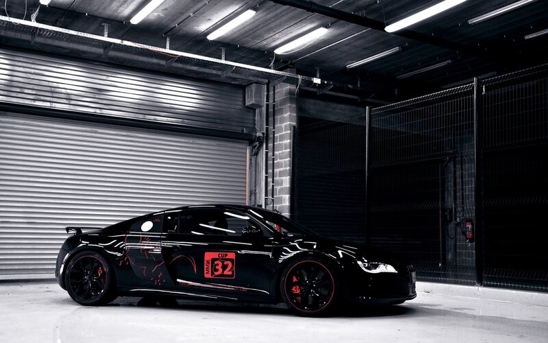Black Sports Car — Dramatic, Photograph, Garage, Roll-up Door