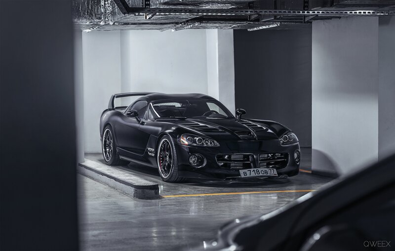 Black Sports Car — Dramatic, Photograph, Parking Garage, License Plate