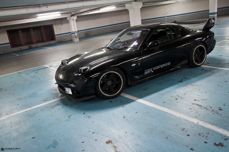 Black Sports Car — Dramatic, Photograph, Parking Garage, Tire
