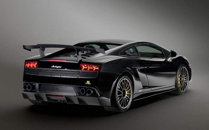 Black Sports Car — Dramatic, Photograph, Rear Wing, Exhaust Pipes, Yellow Brake Calipers, Gray