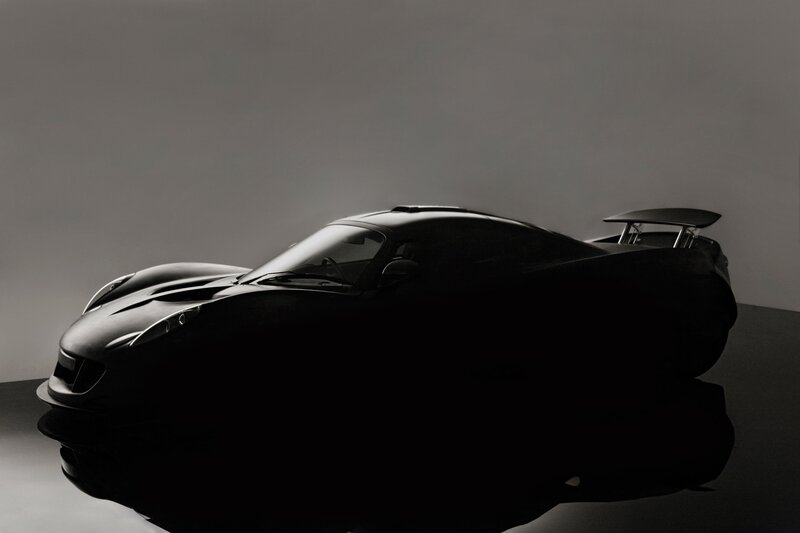 Black Sports Car — Dramatic, Photograph, Rear Wing, Reflective Surface