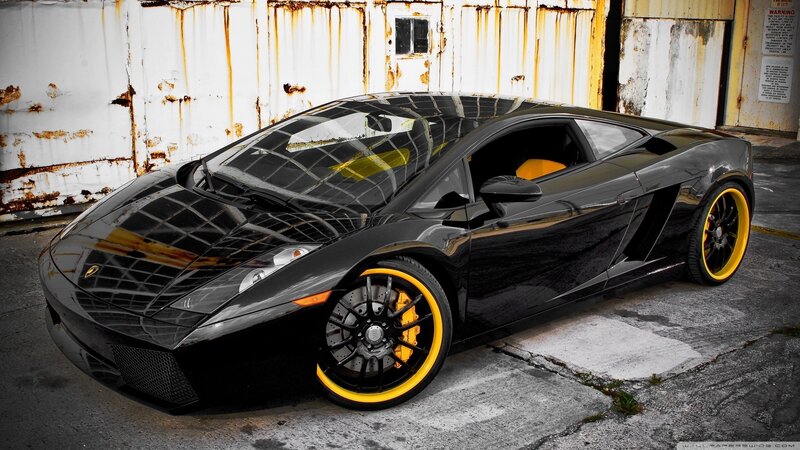 Black Sports Car — Dramatic, Photograph, Rusted Wall