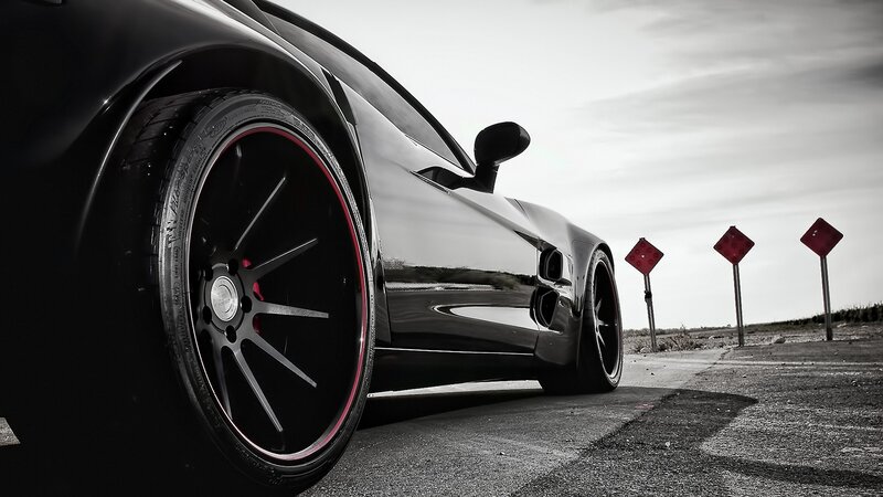 Black Sports Car — Dramatic, Photograph, Wheel, Road Signs