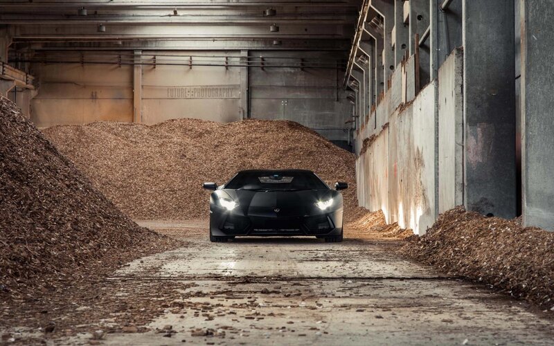 Black Sports Car — Dramatic, Photograph, Wood Chips