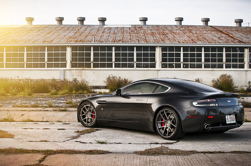 Black Sports Car — Dramatic, Sunset, Photograph, Building, Windows, Gravel