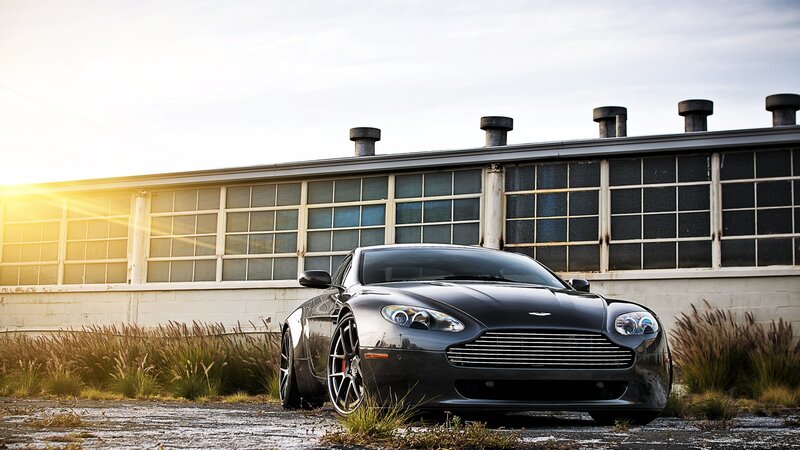 Black Sports Car — Dramatic, Sunset, Photograph, Building, Windows