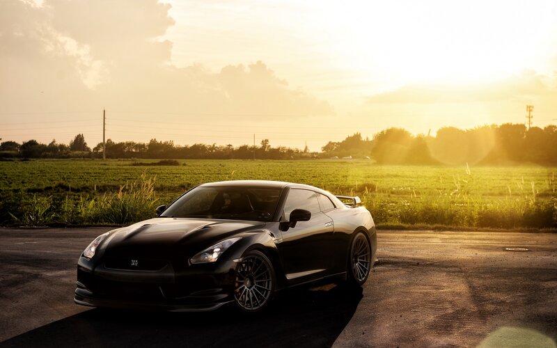 Black Sports Car — Dramatic, Sunset, Photograph, Field, Road, Green