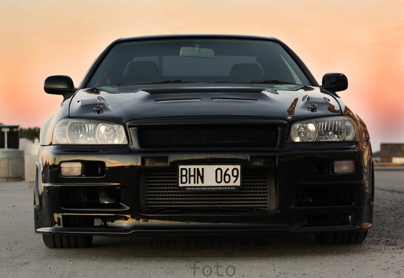 Black Sports Car — Dramatic, Sunset, Photograph, License Plate