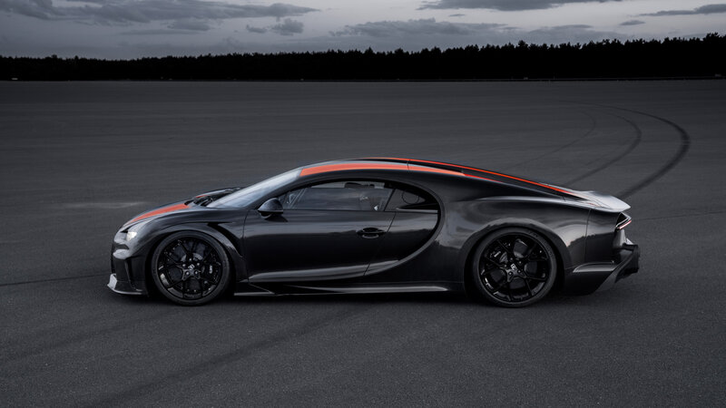 Black Sports Car — Dramatic, Sunset, Photograph, Race Track, Tire Marks