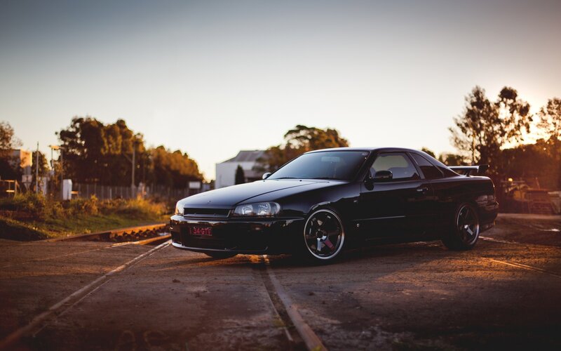 Black Sports Car — Dramatic, Sunset, Photograph, Railroad Tracks