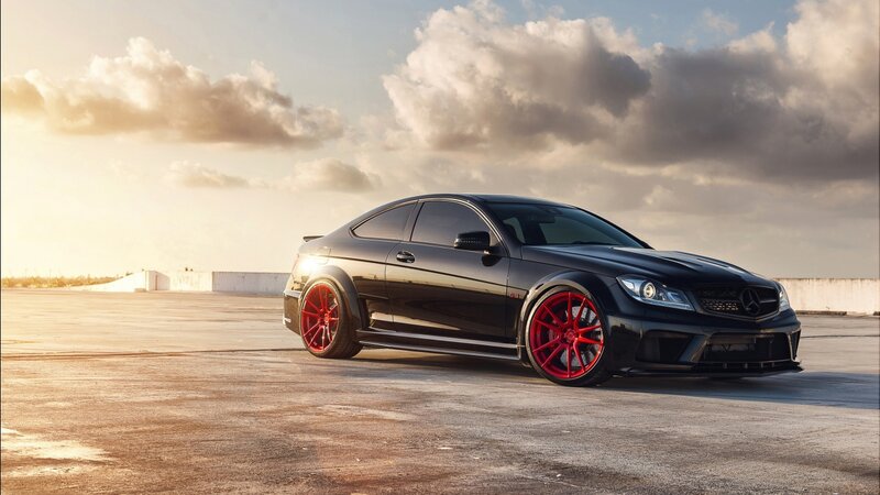 Black Sports Car — Dramatic, Sunset, Photograph, Red Wheels