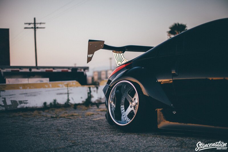 Black Sports Car — Dramatic, Sunset, Photograph, Tail Fin