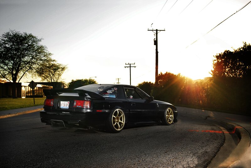 Black Sports Car — Dramatic, Sunset, Photograph, Trees, Power Lines