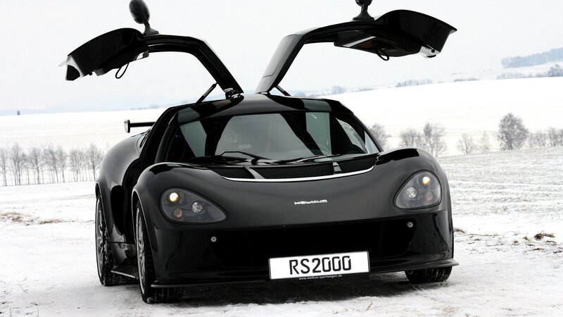 Black Sports Car — Dramatic, Winter, Photograph, Snow, Open Doors, Field
