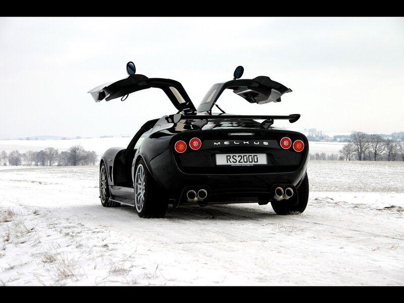 Black Sports Car — Dramatic, Winter, Photograph, Snowy Field