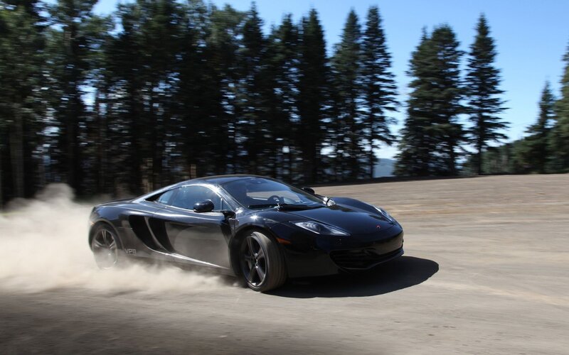 Black sports car drifting