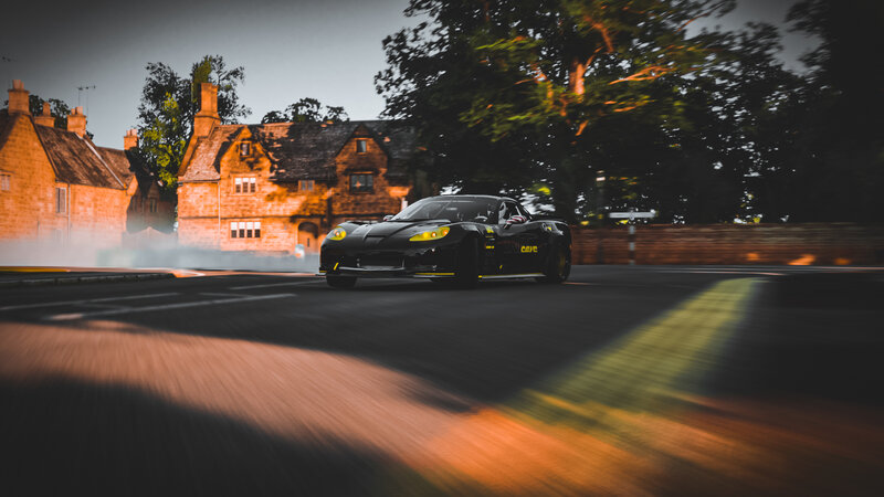 Black Sports Car Drifting — Dramatic, Sunset
