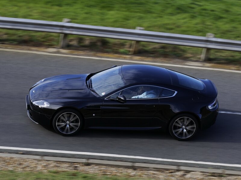 Black Sports Car — Dynamic, Afternoon, Photograph, Road, Guardrail, Driver