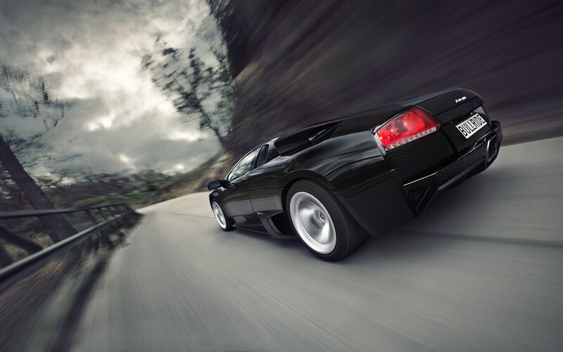 Black Sports Car — Dynamic, Photograph, Road, Trees, Guardrail, Gray, Red