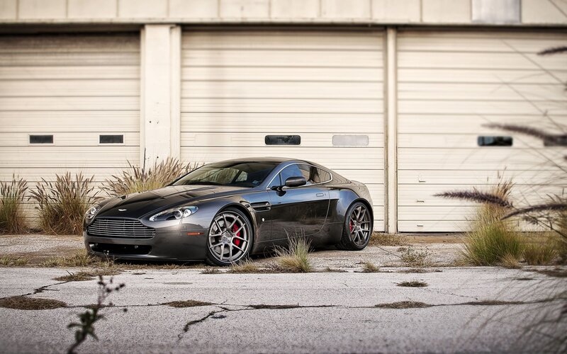 Black Sports Car — Gray, Dramatic, Afternoon, Photograph, Garage Doors