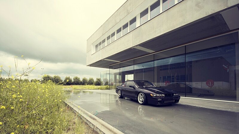 Black Sports Car — Gray, Dramatic, Afternoon, Photograph, Modern Building