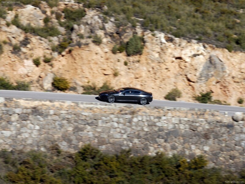 Black Sports Car — Gray, Dynamic, Afternoon, Photograph, Road, Cliff
