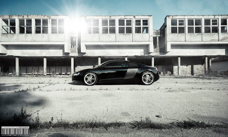 Black sports car in abandoned building