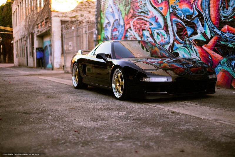 Black sports car in alley