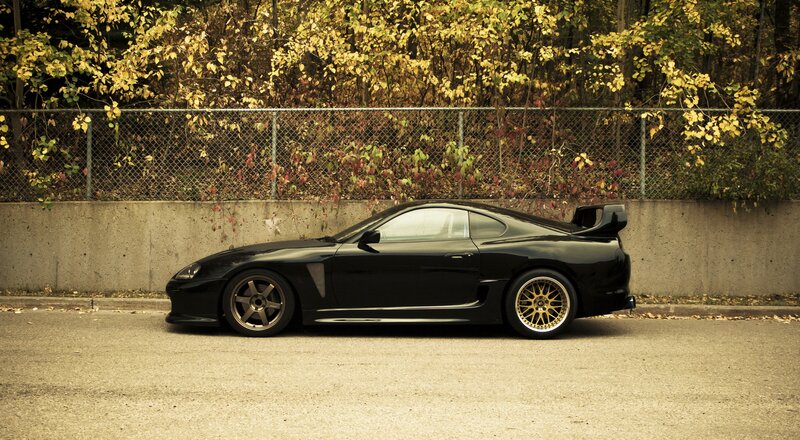 black sports car in autumn