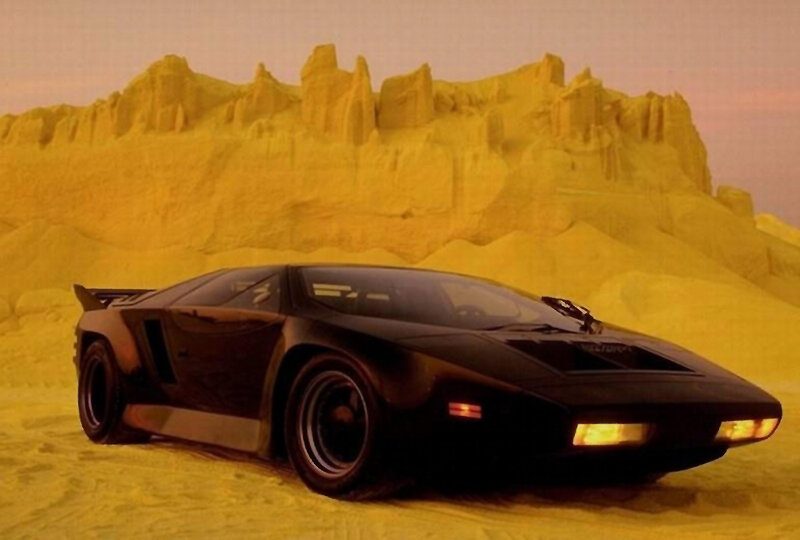 Black sports car in desert
