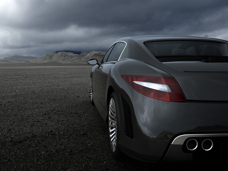 Black sports car in desert