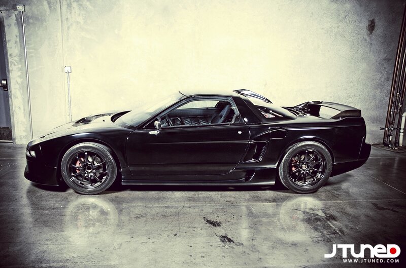 black sports car in garage