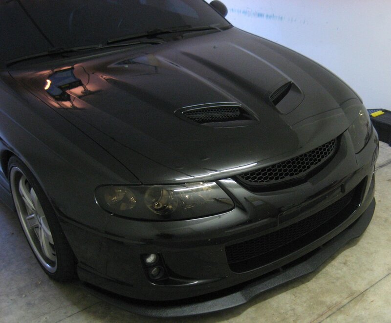 black sports car in garage