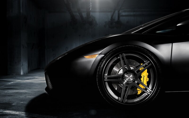 black sports car in garage