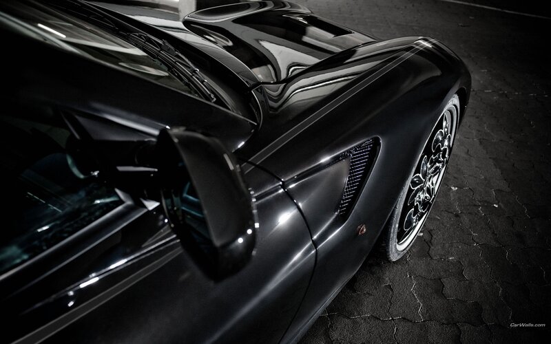 black sports car in garage