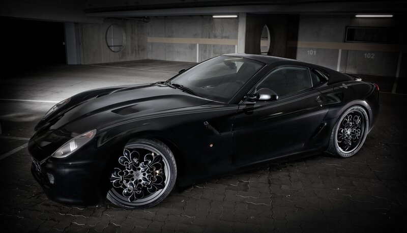 black sports car in garage
