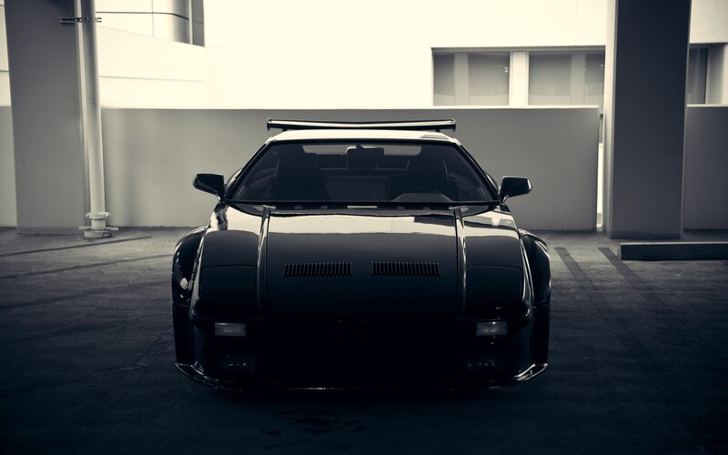 black sports car in garage