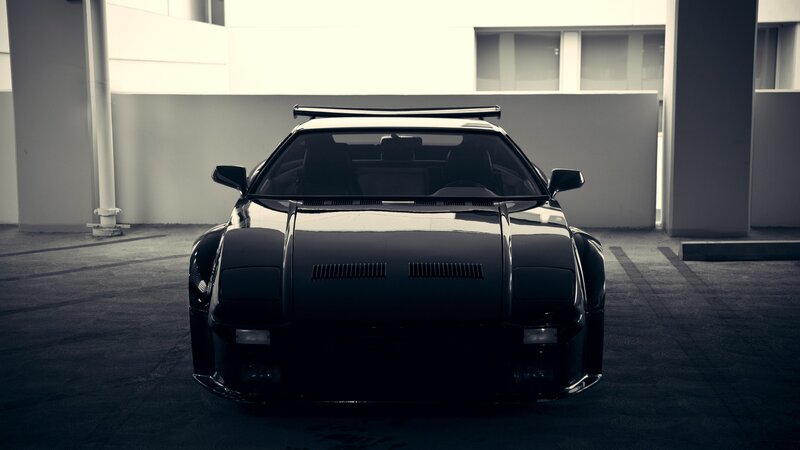 black sports car in garage