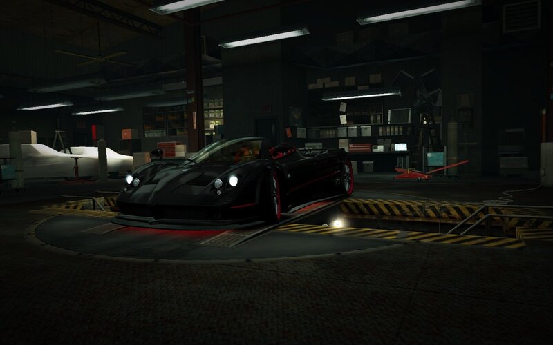 Black sports car in garage