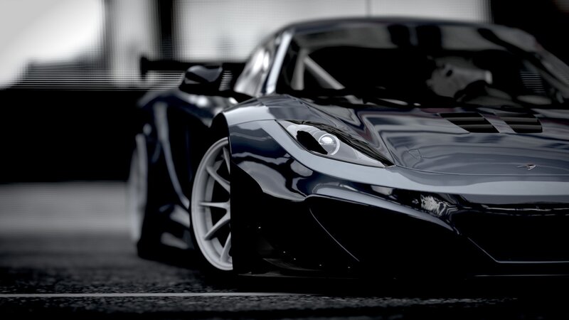 black sports car in garage