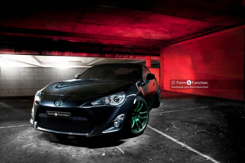 black sports car in garage