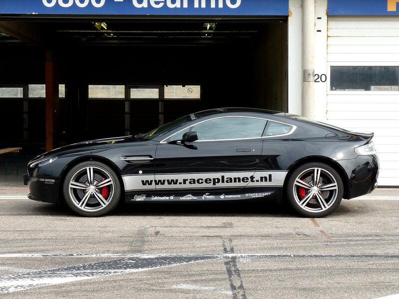 Black sports car in garage