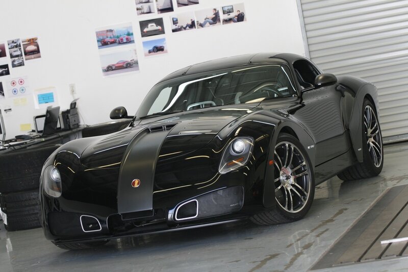black sports car in garage