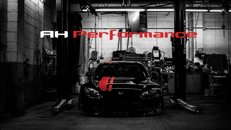 Black Sports Car in Garage — Dramatic
