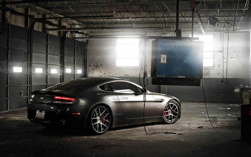 Black Sports Car in Garage — Gray, Dramatic