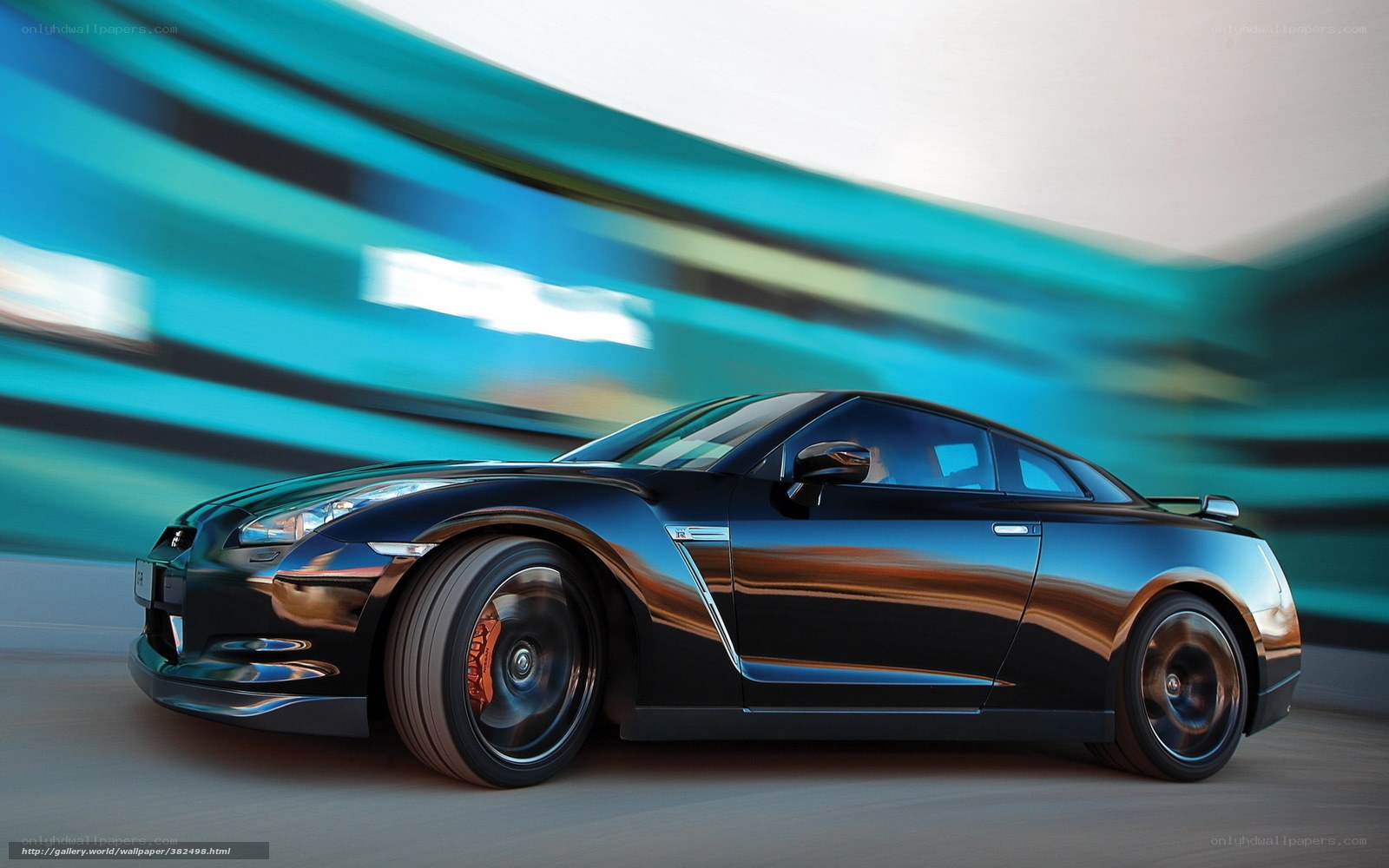 Black sports car in motion